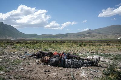 Afghan men asleep in the open in Tatvan district, east Turkey. EPA