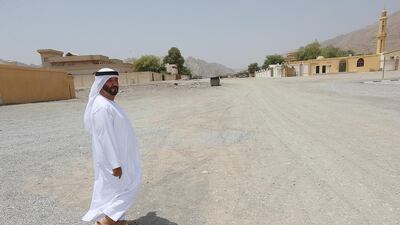 Rashed Al Hayri is one of the residents calling for a 24-hour medical centre and improved roads. Satish Kumar / The National