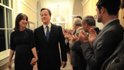 David Cameron, the new Prime Minister, and his wife Samantha enter No 10 Downing Street after his meeting with Queen Elizabeth II in May 2010. All photos: Getty Images unless otherwise stated