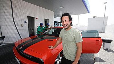 Omar al Messery stands by his limited edition Dodge Challenger SRT8. Having previously owned several luxury German cars, Omar loves the excitement the Dodge creates.