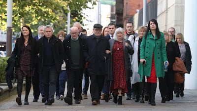 Relatives of Aidan McAnespie arrive with supporters at Laganside Courts in Belfast. PA