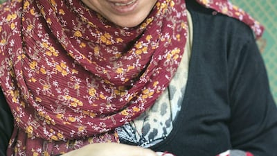 An artisan from 81 Designs working on eL Seed's designs