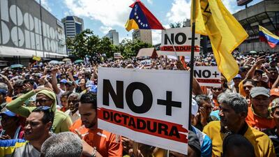 The Venezuelan legislature’s refusal to approve oil joint ventures was a political flashpoint last week when the country’s supreme court move to seize power from it, a sign of how important oil is to the country’s flailing economy. Ensuing protests led the court to reverse its decision. The protesters’ signs above read ‘no to dictatorship’. Juan Barreto / AFP