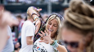 A woman dances during a Dead & Company concert. Photo Courtesy: Jay Blakesberg