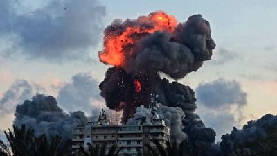 A ball of fire and smoke erupts from a building hit by an Israeli strike on Tyre, southern Lebanon. AFP