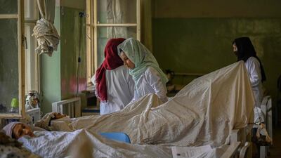 Female nurses takes care of patients at Wazir Akbar Khan hospital in Kabul. AFP