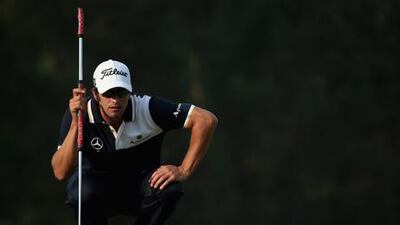 Adam Scott lines up a putt at the WGC HSBC Champions event in China