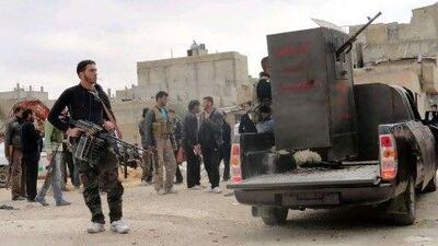 Members of the Free Syrian Army retreated from the Baba Amr district of Homs after Syrian troops, led by the brother of President Bashar Al Assad, launched a ground attack to overrun the neighbourhood.