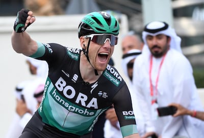 Sam Bennett celebrates winning Stage 7. EPA