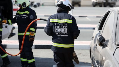A door was removed from a car to allow the team to practice how they would respond to a car accident