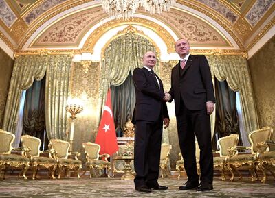 Russian President Vladimir Putin, left, with Turkish President Recep Tayyip Erdogan in the Kremlin. Alexei Nikolsky / Kremlin Pool Photo via AP