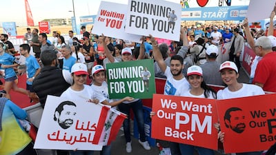 Placards at the Beirut marathon on Sunday, November 12, 2017 calling for the return of Saad Hariri, who resigned unexpectedly as prime minister on November 4 during a visit to Saudi Arabia, where he remains. Wael Hamzeh / EPA