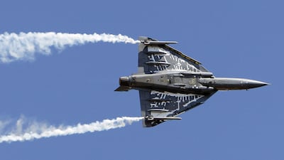 India's light combat aircraft Tejas over Bangalore, India. The country's navy has rejected the aircraft as it has raised concerns over its ability to take off when fully loaded. Aijaz Rahi / AP