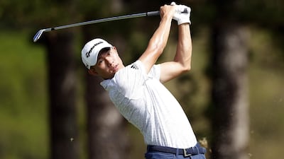 Collin Morikawa plays his shot from the second tee during the first round of the Sentry Tournament Of Champions. AFP