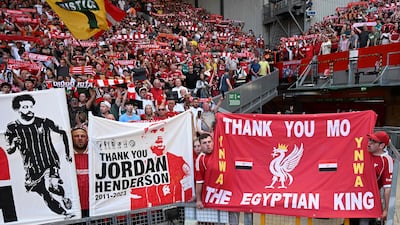 Fans thank Jordan Henderson and Egyptian star Mohamed Salah ahead of the match against Brentford at Anfield. AFP