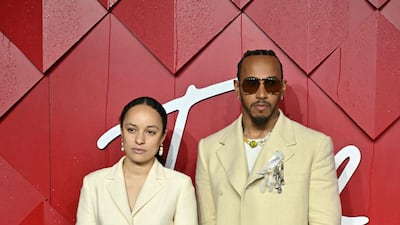 F1 driver Lewis Hamilton and fashion designer Grace Wales Bonner arrive at the 2023 Fashion Awards. AFP