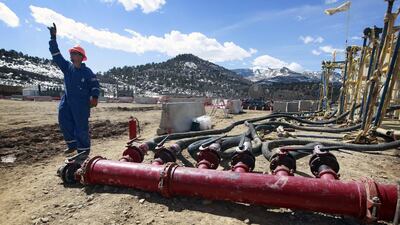 A hydraulic fracturing and extraction site in western Colorado. The US is whittling its oil imports to a 16-year low. Brennan Linsley / AP Photo