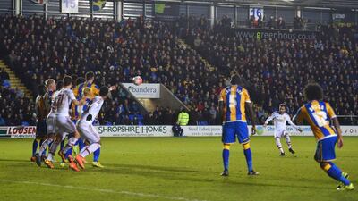 SHREWSBURY, ENGLAND - FEBRUARY 22: Juan Mata of Manchester United (2R) scores their second goal from a free kick during the Emirates FA Cup fifth round match between Shrewsbury Town and Manchester United at Greenhous Meadow on February 22, 2016 in Shrewsbury, England. (Photo by Michael Regan/Getty Images)
