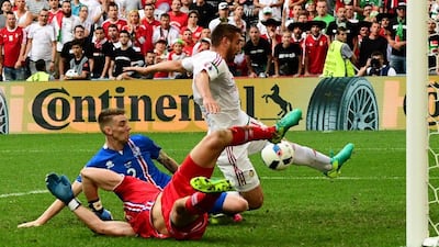 Iceland defender Birkir Saevarsson (2ndL) scores an own goal during the Euro 2016 Group F football match between Iceland and Hungary at the Stade Velodrome in Marseille on June 18, 2016. Attila Kisbenedek / AFP