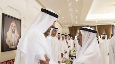 Sheikh Mohammed bin Zayed, Crown Prince of Abu Dhabi and Deputy Supreme Commander of the Armed Forces, speaks with a guest during the group wedding held at Al Bateen Majlis. Mohamed Al Suwaidi / Crown Prince Court - Abu Dhabi