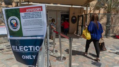 People head into the consulate, on Beirut Street