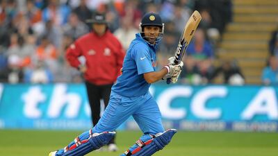 India's Rohit Sharma is unlucky to not make it in the final XI after scoring 168 runs from four games. But he will be 12th man and the reserve opener. Andrew Yates / AFP