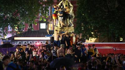Scotland fans celebrate in London after the 0-0 draw with England. Reuters
