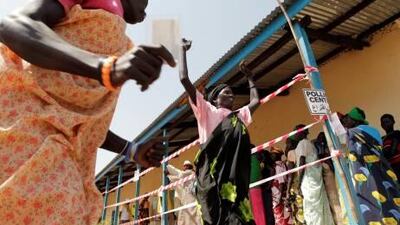 South Sudanese women celebrate after casting their ballots in the referendum yesterday in the village of Peiti, northwest of Juba.