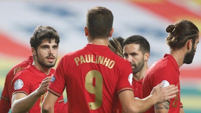 Pedro Neto (L) celebrates after scoring Portugal's first goal against Andora. EPA