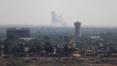 Smoke rises in the northern Sinai Peninsula as seen from the Egyptian border on July 1, 2015. Reuters