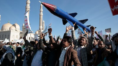 Houthi supporters attend a rally in Sanaa in support of Palestinians in the Gaza Strip and against the US-led air strikes on Yemen. AP