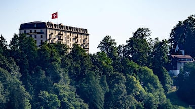 This photograph shows a part of the Burgenstock luxury hotel complex above Lake Lucerne, where talks following up on a deal to end the Middle East conflict were scheduled to begin, on June 19, 2026. Switzerland announced on June 19, 2026 that planned talks following up on the deal to end the Middle East war had been postponed, hours after US Vice President JD Vance's departure for the Alpine country was cancelled. (Photo by Fabrice COFFRINI / AFP)