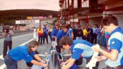 AGS mechanics work on Fabrizio Barbazza's car.