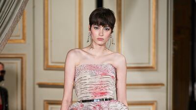 Armani Prive created dresses of tightly layered tulle, and soft, almost hand-painted flowers.