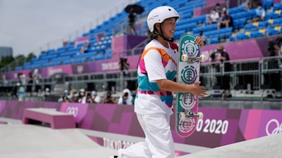 Gold medal winner Momiji Nishiya of Japan walks off the course after winning the women's street skateboarding finals.