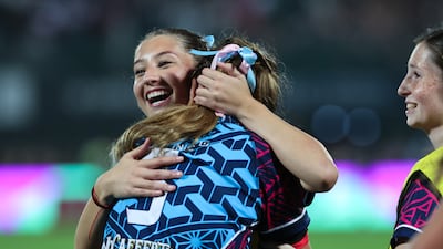 Dubai Warriors celebrate after defeating Dubai College during the Gulf Under-19 Girls final at the Emirates Dubai Sevens. Victor Besa / The National