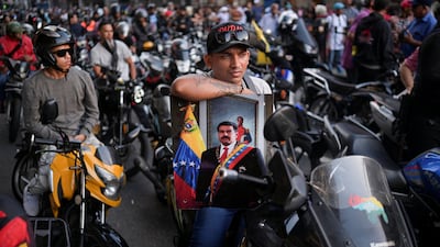 In Caracas, Venezuela, members of a militia group calling itself Colectivos call for the release of President Nicolas Maduro from US custody. Reuters