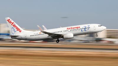 An Air Europa Boeing 737-800 airplane takes off at the airport in Palma de Mallorca, Spain. Aviation giant IAG has made a €1bn bid for the low-cost carrier. Reuters