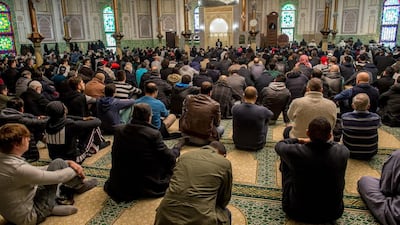 A Muslim cleric speaks ahead of Friday prayers at the Grand Mosque in Brussels. Photo: AFP PHOTO / PHILIPPE HUGUEN
