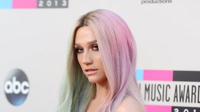 Ke$ha arrives at the American Music Awards. Jordan Strauss / Invision / AP