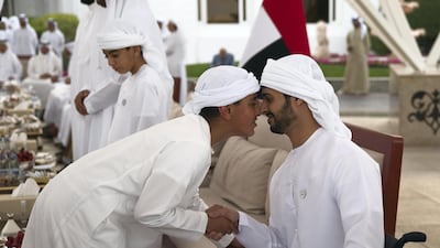 Sheikh Zayed bin Mohammed bin Hamad greets Sheikh Zayed bin Hamdan during a Sea Palace barza. Abdullah Al Junaibi for the Crown Prince Court - Abu Dhabi