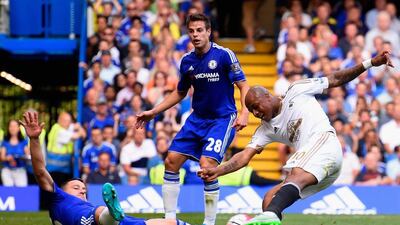Andre Ayew of Swansea City scores his team’s first goal during the Premier League match between Chelsea and Swansea City at Stamford Bridge. (Photo by Mike Hewitt/Getty Images)