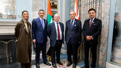 Sheikh Abdullah bin Zayed, second left, with Noura Al Kaabi, left, Alistair Burt, centre, UK Minister of State for the Middle East and North Africa; Zaki Nusseibeh, second right, and Sulaiman Al Mazroui. All photos Courtesy MOFAAIC
