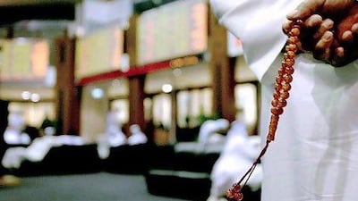 The Dubai index closed down after mid-morning gains. Marwan Naamani / AFP