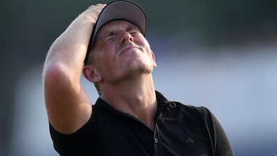 England's Matt Wallace reacts on the 18th hole during the final round of the DP World Tour Championship golf tournament in Dubai, United Arab Emirates. AP Photo