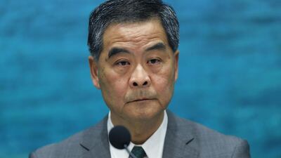 Hong Kong chief executive Leung Chun-ying at the government headquarters in Hong Kong, where he announces that he will implement the Chinese legislative panel’s ruling that bars two democratically elected separatist lawmakers from taking office in Hong Kong. Vincent Yu / AP Photo