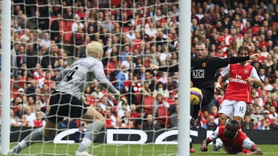 Wayne Rooney of Manchester United scores at the Emirates Stadium in 2007. Getty Images