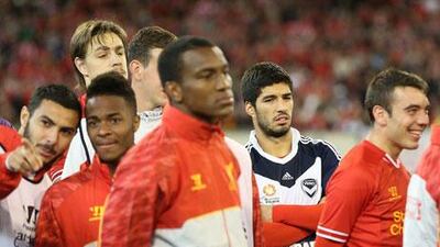 Brendan Rodgers expects Luis Suarez, second right, to fit back into the Liverpool squad despite feeling unsettled.