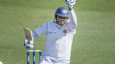 Kumar Sangakkara of Sri Lanka celebrates his double century on Sunday during Day 2 of the second Test against New Zealand in Wellington. Marty Melville / AFP / January 4, 2015