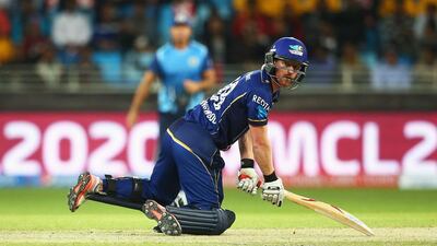 DUBAI, UNITED ARAB EMIRATES - JANUARY 29: Paul Collingwood of Capricorn Commanders falls playing a shot during the Oxigen Masters Champions League 2016 match between Capricorn Commanders and Leo Lions at Dubai International Cricket Stadium on January 29, 2016 in Dubai, United Arab Emirates. (Photo by Francois Nel/Getty Images)